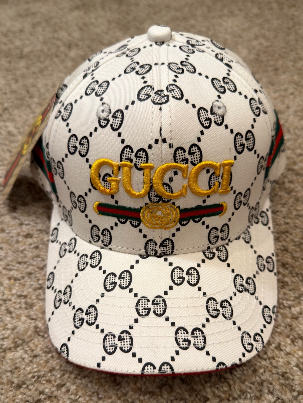 White Cap with Yellow Logo and Green-Red Stripe